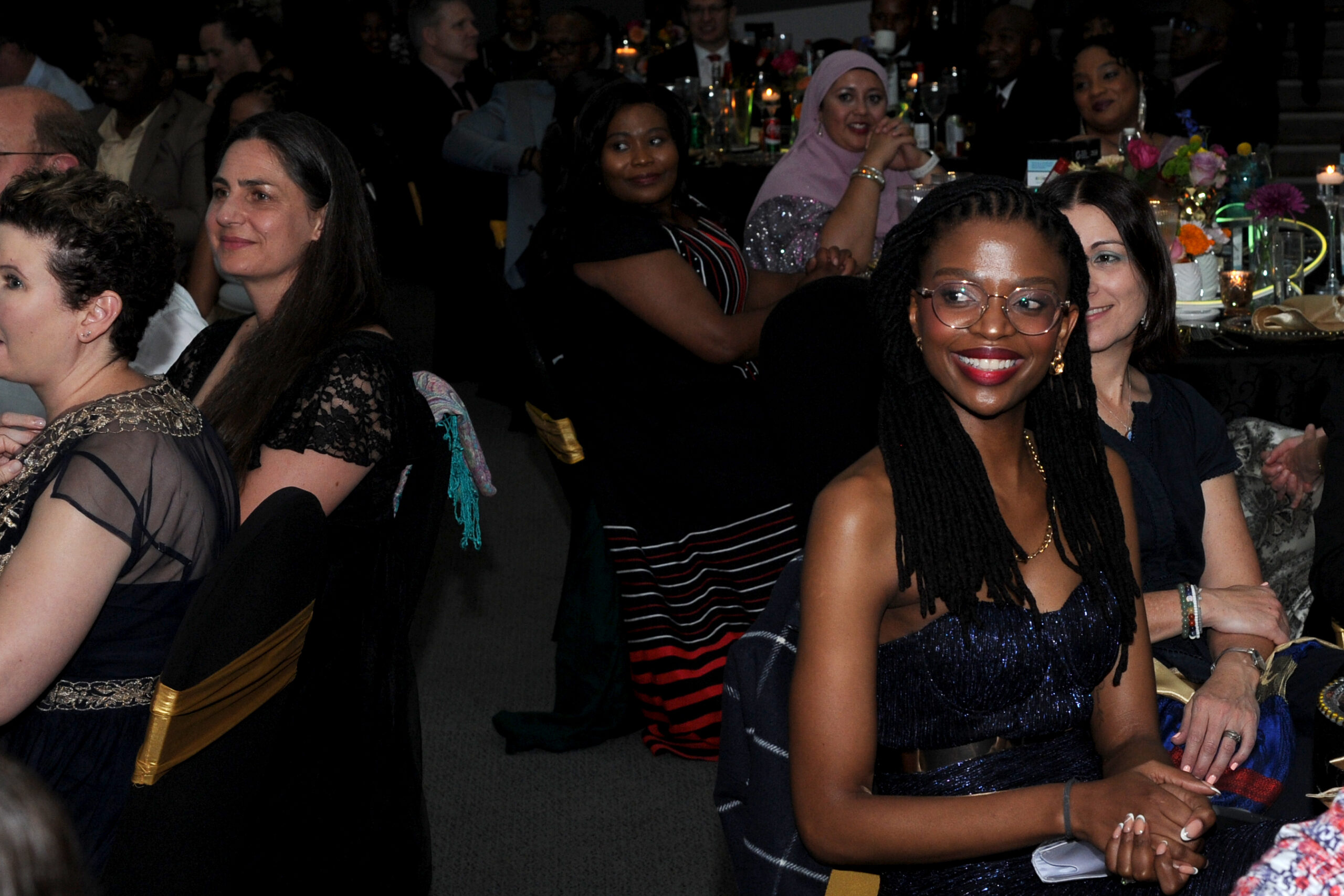 Smiles turning into laughter — the ultimate sign of a great night