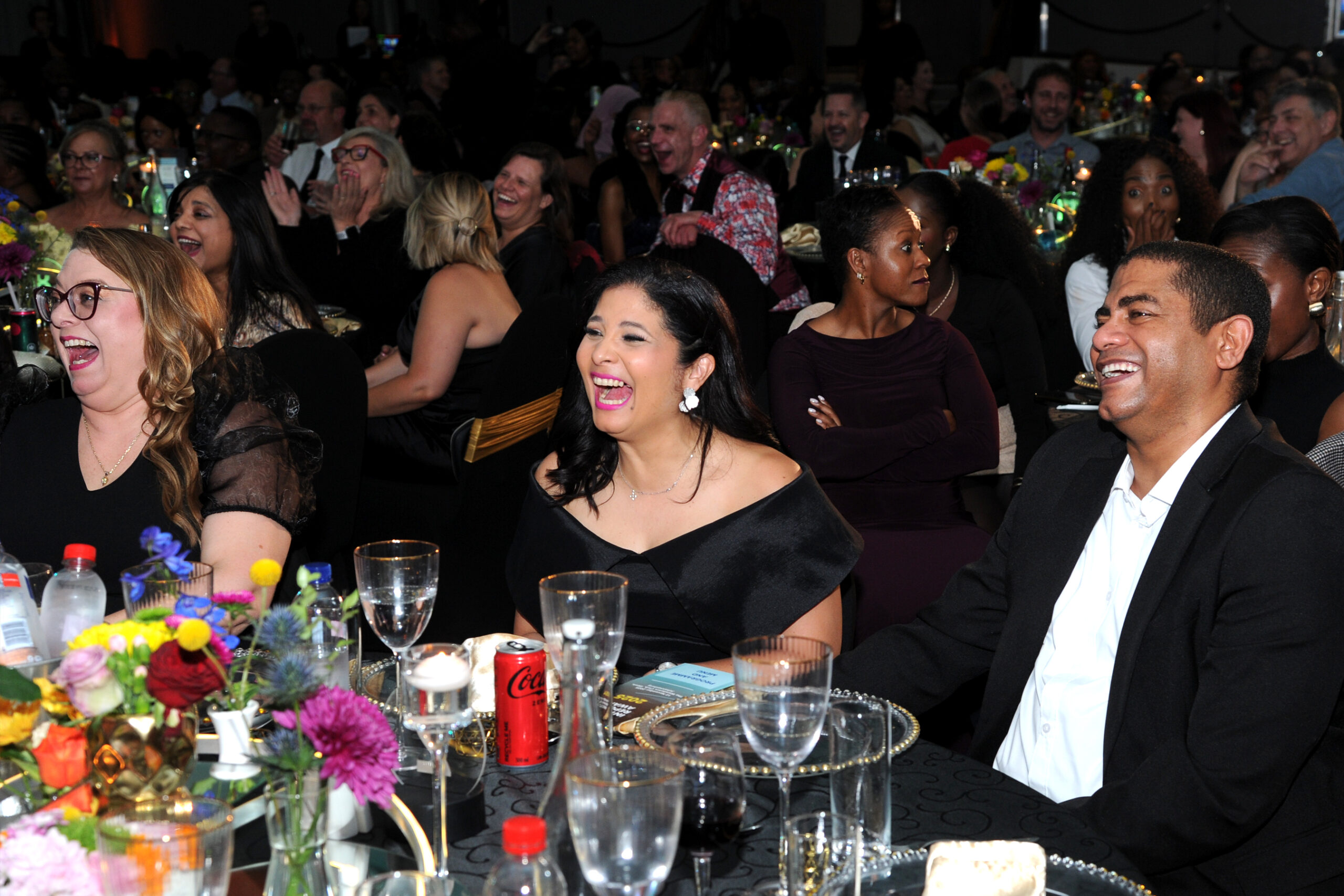Laughter rolling from table to table — the atmosphere was contagious: 
CGISA directors - Charissa Carpenter and Karen Goldstone-Hoffman with her partner Emlyn Hoffman
